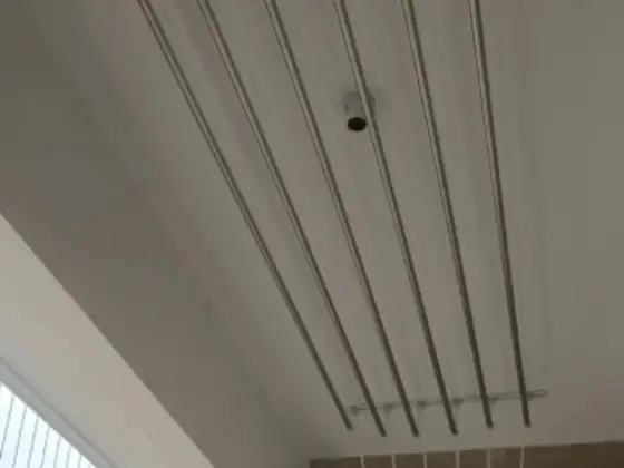 Pulley cloth hanger with clothes drying (close-up view)
