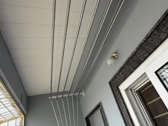 Ceiling cloth hanger fitted on an apartment balcony in Madhavaram, Chennai (wider view)
