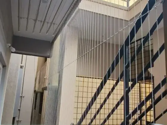 Ceiling-mounted drying hanger on a balcony in KK Nagar, Chennai (site photo)