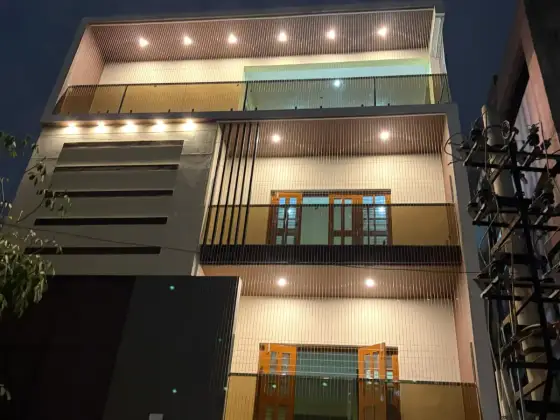Invisible grill fitted across an apartment balcony (wider view)