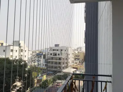 Balcony protected with an invisible grill in Chennai (wider view)