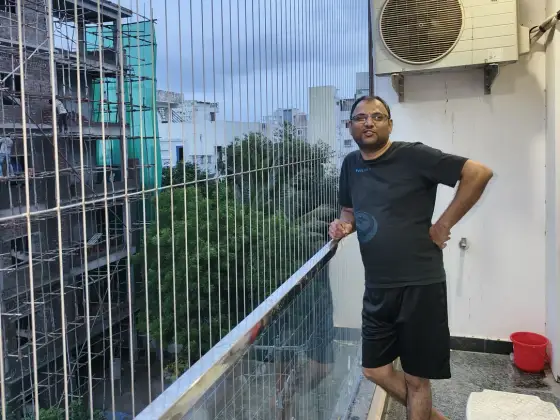Balcony protected with an invisible grill in Thoraipakkam, Chennai (site photo)