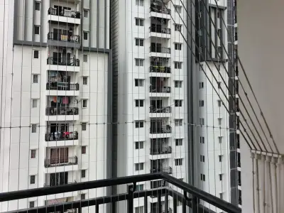 Invisible grill fitted across an apartment balcony in Chennai (detail shot)