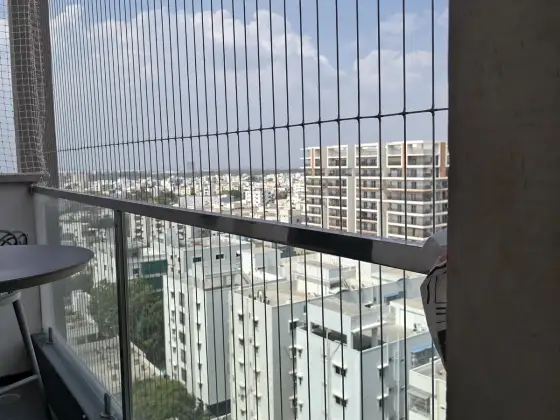 Balcony protected with an invisible grill in Guindy, Chennai (detail shot)
