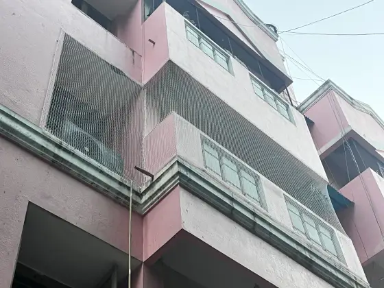 Balcony bird-proofed with a pigeon net in Chennai