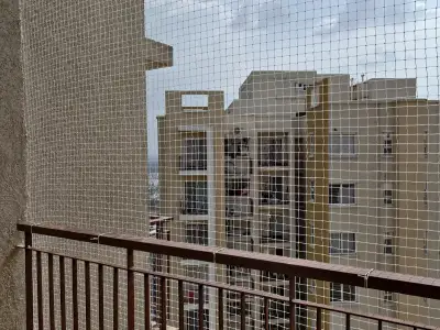 Balcony bird-proofed with a pigeon net (wider view)