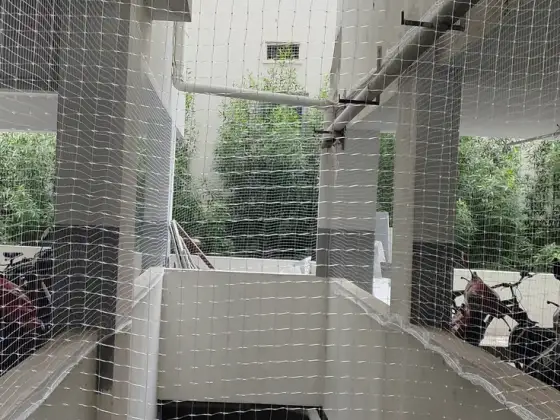 Pigeon net covering an apartment duct area (wider view)