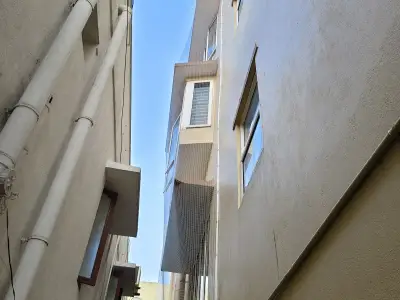 Pigeon-proof net on a high-floor window in Chennai (close-up view)
