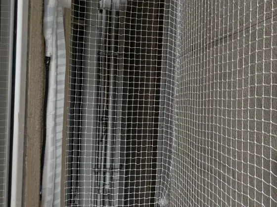 Safety net fitted across an apartment balcony in Madhavaram, Chennai (finished installation)