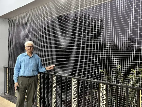 Clear safety net protecting an open balcony in Royapuram, Chennai (finished installation)
