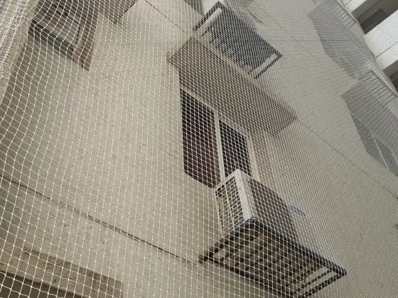 Safety netting across multiple floors of an apartment block in T Nagar, Chennai (close-up view)