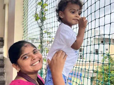 Fine-mesh safety net protecting a child's play area in Chennai (close-up view)