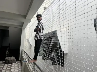 Reinforced child-safe net on a balcony in Chennai (close-up view)