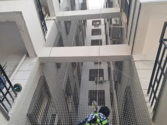 Duct area protected with a fine mesh net in Vadapalani, Chennai