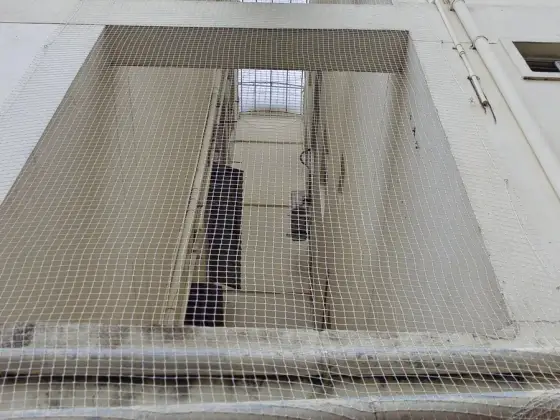 Safety net covering an apartment duct area in Adyar, Chennai (wider view)