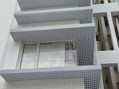 Window safety net fitted on an apartment in Chennai (close-up view)