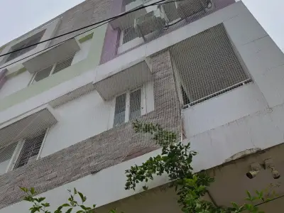 Window safety net fitted on an apartment in Chennai (wider view)