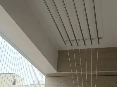 Wall-mounted drying hanger in a utility area in Chennai