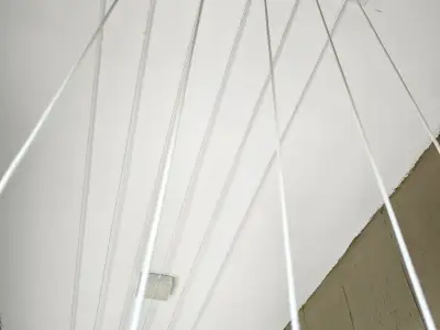 Wall-mounted drying hanger in a utility area in Chennai (wider view)
