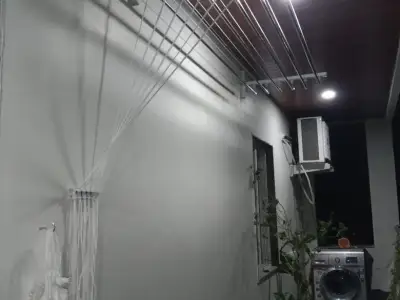 Wall-mounted cloth hanger fitted on a balcony wall in Chennai (finished installation)